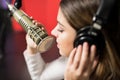 Woman singer face singing in a radio show