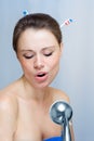 Woman singing in the shower Royalty Free Stock Photo