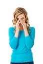 Woman with sinus pressure pain