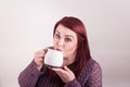 Woman sipping cup of warm black coffee Royalty Free Stock Photo