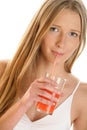 Woman sipping juice Royalty Free Stock Photo