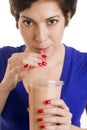 Attractive Woman sips Flesh Tone Smoothie