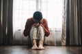 woman sit Depression Dark haired pensive glance Standing by window and anxiety Copy space Royalty Free Stock Photo