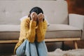 woman sit Depression Dark haired pensive glance Standing by window and anxiety Copy space. at home Royalty Free Stock Photo