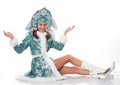 woman siting dressed as snow maiden