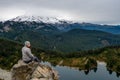 Woman Sits on Outcropping from Tolmie Peak Royalty Free Stock Photo