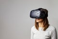 Woman Sits On Sofa At Home Wearing Virtual Reality Headset Royalty Free Stock Photo