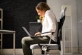 Woman Sitting In Bad Posture Working On Computer Royalty Free Stock Photo