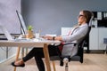 Woman Sitting In Bad Posture Working On Computer Royalty Free Stock Photo