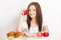 Woman sitting behind the table with food Royalty Free Stock Photo