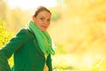 Woman sitting on big tree trunk Royalty Free Stock Photo