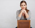 Woman sitting on chair , beautiful model . Chair back . Royalty Free Stock Photo