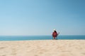 Woman sitting on a chair have an amazing view.