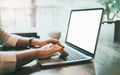 woman sitting the chair research course online website and studying learning on a mockup white screen laptop, e-learning