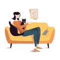 a woman sitting on a couch with a cat on her lap and a cat sitting on her lap looking at a book on her lap Royalty Free Stock Photo