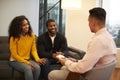 Woman Sitting On Couch Meeting With Male Relationship Counsellor In Office Royalty Free Stock Photo