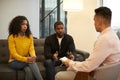 Woman Sitting On Couch Meeting With Male Relationship Counsellor In Office Royalty Free Stock Photo