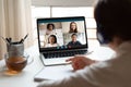 Woman studying at home with multiracial students via video conference Royalty Free Stock Photo