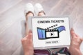 Online cinema tickets booking concept on a tablet