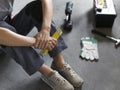 Woman sitting on the floor and planning a home renovation Royalty Free Stock Photo