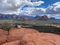 A woman sitting with her daughter at the Airport Mesa Sedona vortex overlooking Sedona, Arizona Royalty Free Stock Photo