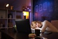 Woman sleeping at her desk while working late Royalty Free Stock Photo