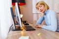 Woman tired at work, sleeping at her desk Royalty Free Stock Photo