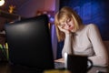 Woman sleeping at her desk while working late Royalty Free Stock Photo