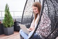 Woman sitting with her laptop copmputer Royalty Free Stock Photo