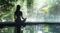 a woman is sitting in a lotus position on a bridge overlooking a pond Royalty Free Stock Photo