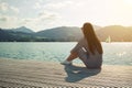 Woman sitting on the moorage