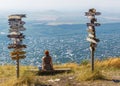 Woman sitting on the peak of Mashuk mountain Royalty Free Stock Photo