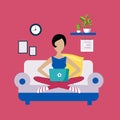 Woman Sitting On Sofa Working Freelance