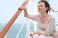 Woman sitting on stairs on cruise liner deck Royalty Free Stock Photo