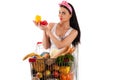 Woman sitting in supermarket trolley Royalty Free Stock Photo