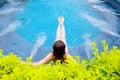 Woman sitting in swimming pool Royalty Free Stock Photo