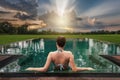 Woman sitting in swimming pool Royalty Free Stock Photo