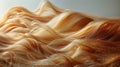 Woman Sitting at Table With Bottles of Hair