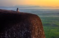 Woman sitting on the three whale rock mountain at Bueng Kan Province,Thailand Royalty Free Stock Photo