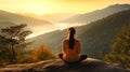 a woman sitting on top of a rock looking at mountains Royalty Free Stock Photo