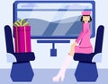 Woman sitting in a train in front of a window with a present box Royalty Free Stock Photo