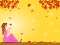 Woman sitting under a tree with colorful leaves There is yellow in the background. Royalty Free Stock Photo