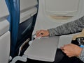 Wiping dirty airplane tray