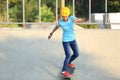 Woman skateboarders riding on a skateboard