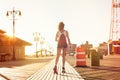 Woman skating on road