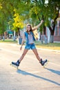 Woman skating during sunset