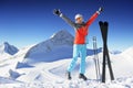 Woman in Ski resort jumping and smiling