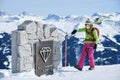 Woman skier at the start of Black Diamond ski slope in Arosa - Lenzerheide ski resort, a popular black piste. Arosa, Switzerland