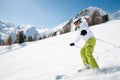 Woman skiing downhill