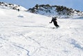 Woman is skiing at a ski resort Royalty Free Stock Photo